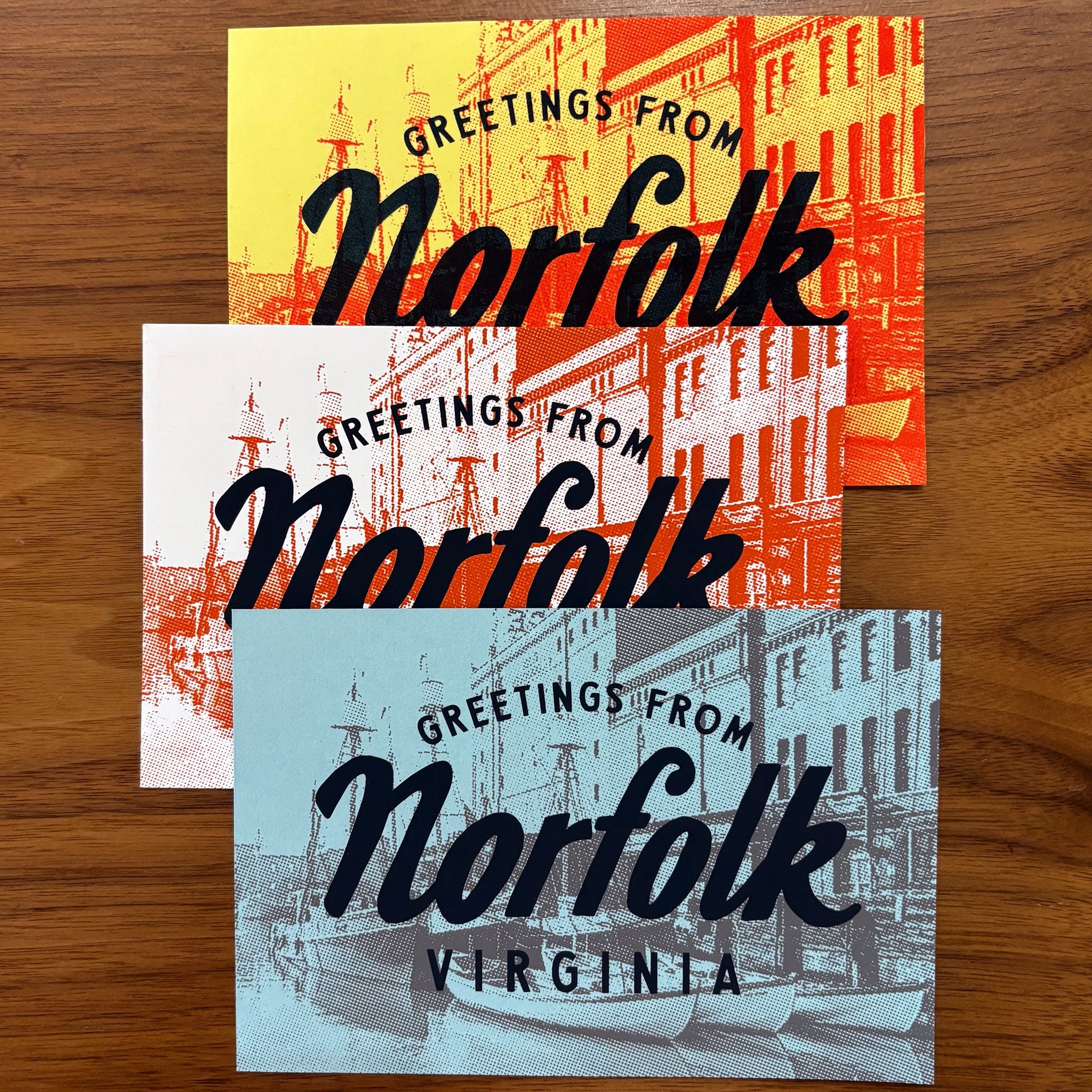 Three postcards "Greetings from Norfolk" in different colors
