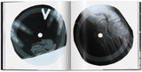Double-page spread showing two interesting vinyl records.