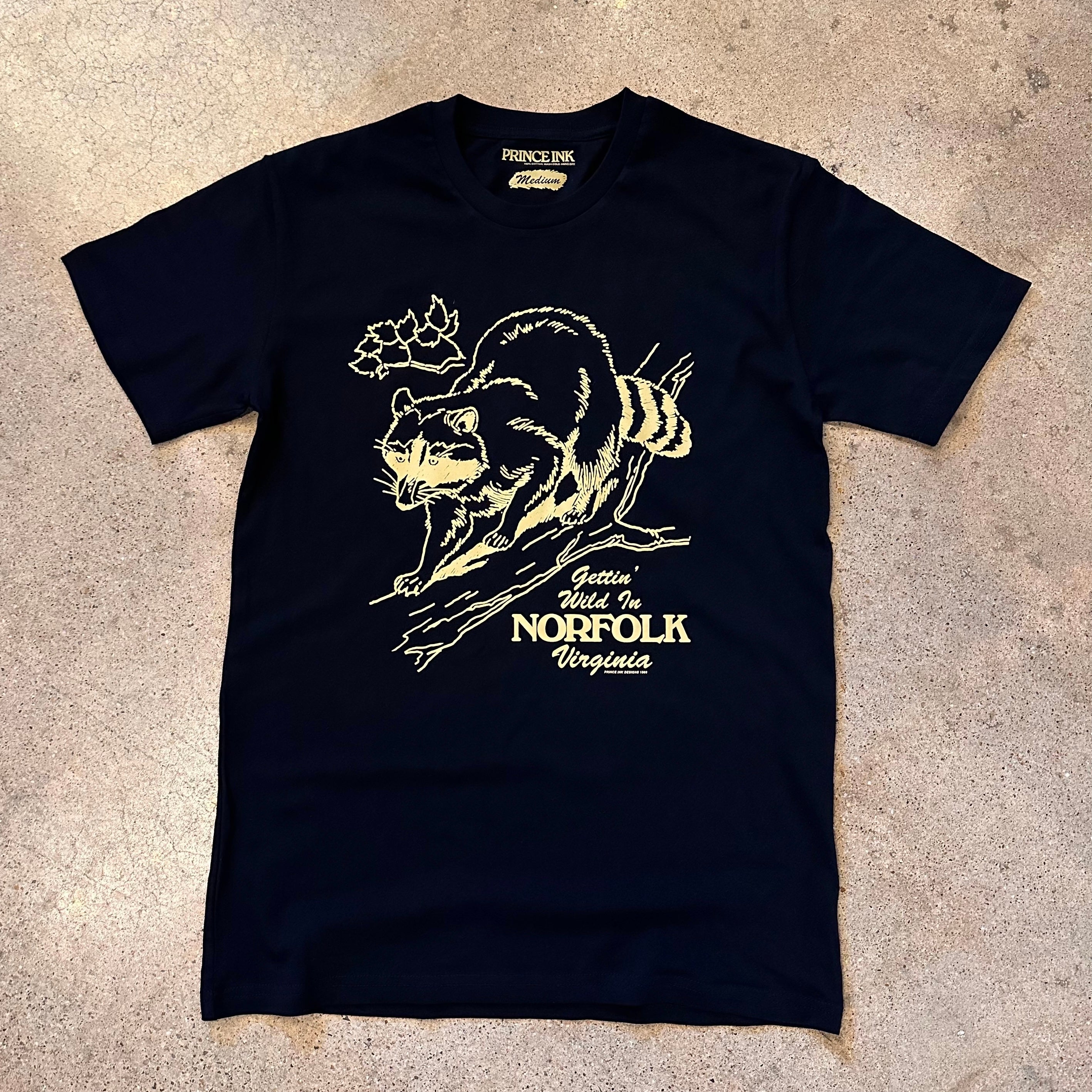 Raccoon with the text, "Gettin' Wild In Norfolk Virginia" on a black tee