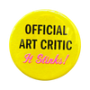 Yellow button with a slogan: Official Art Critic - It Stinks!