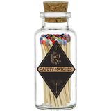 Glass jar with cork lid containing colorful safety matches from The Lost Wax Co.